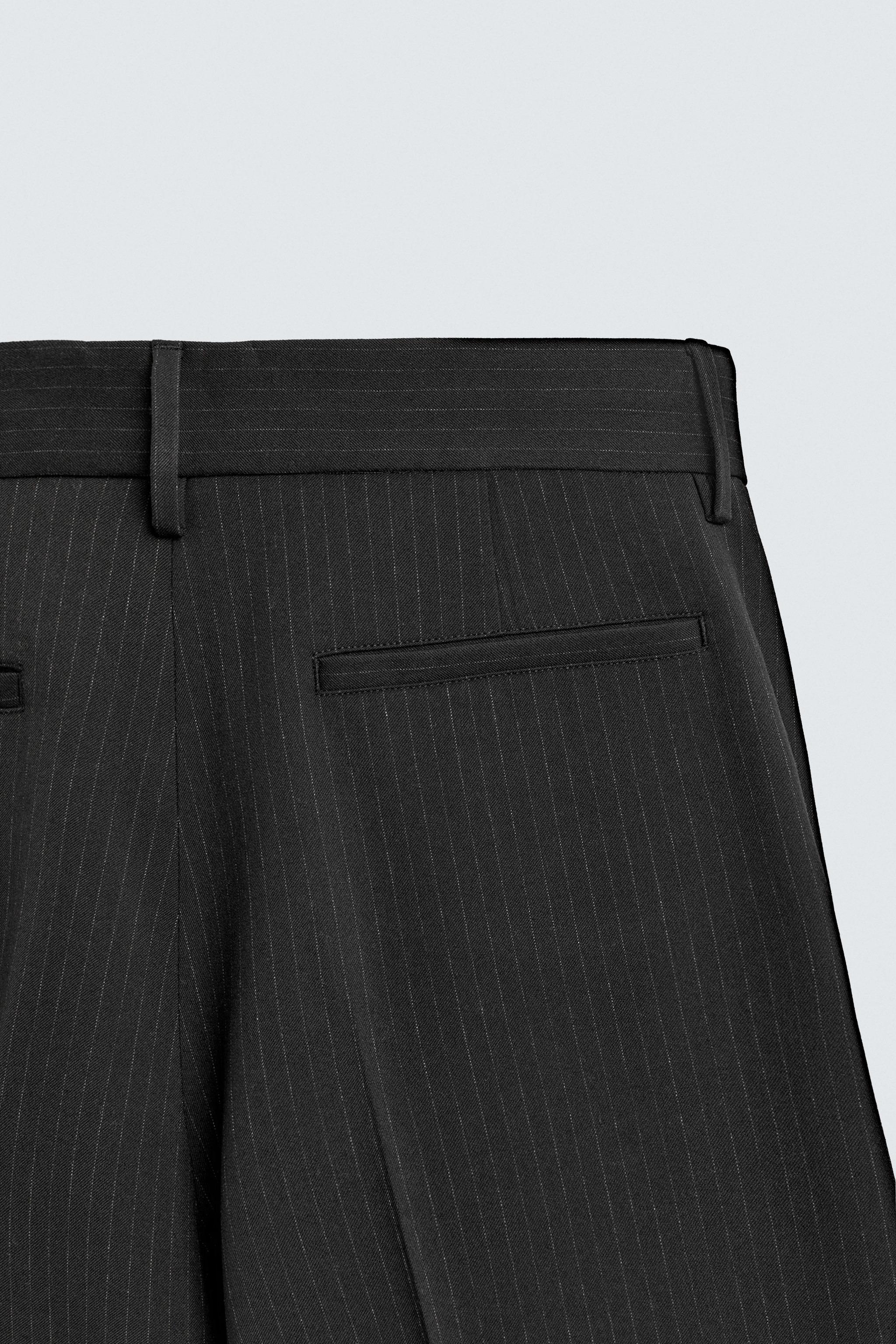 PLEATED WIDE FIT PANTS
